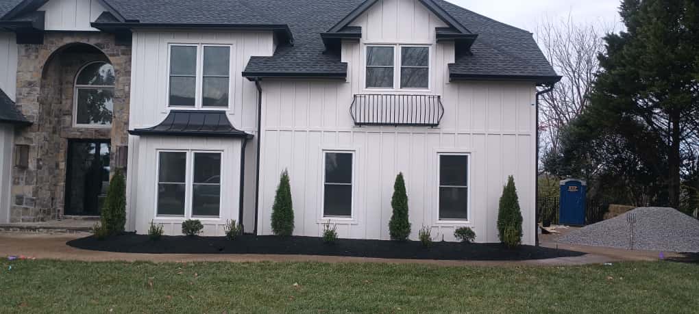 Modern home with professional irrigation and landscaping